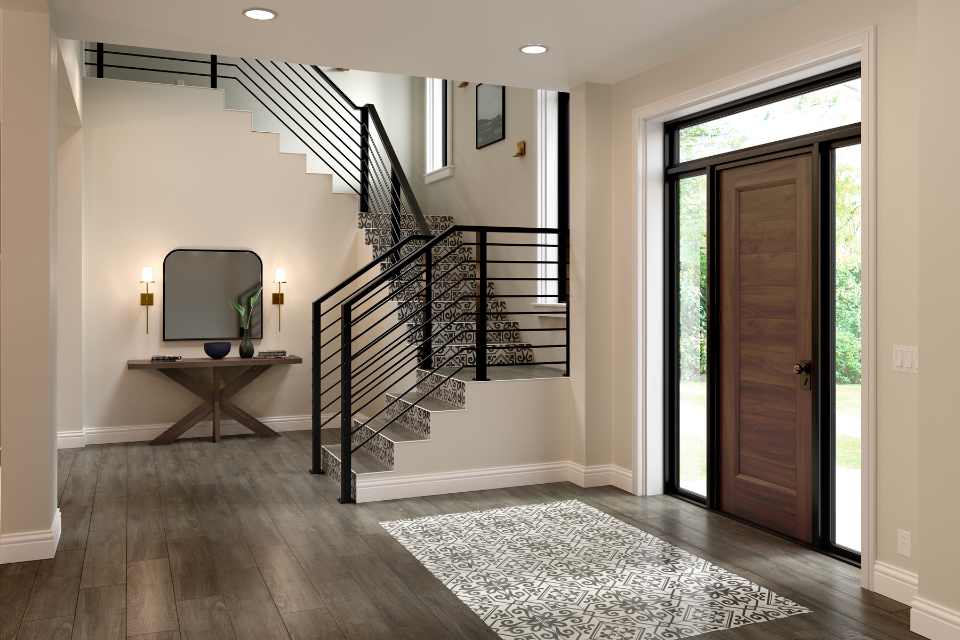 black and white mosaic tile inlay in wood flooring of modern entryway 